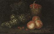 Peaches and grapes with a wicker basket of wild strawberries